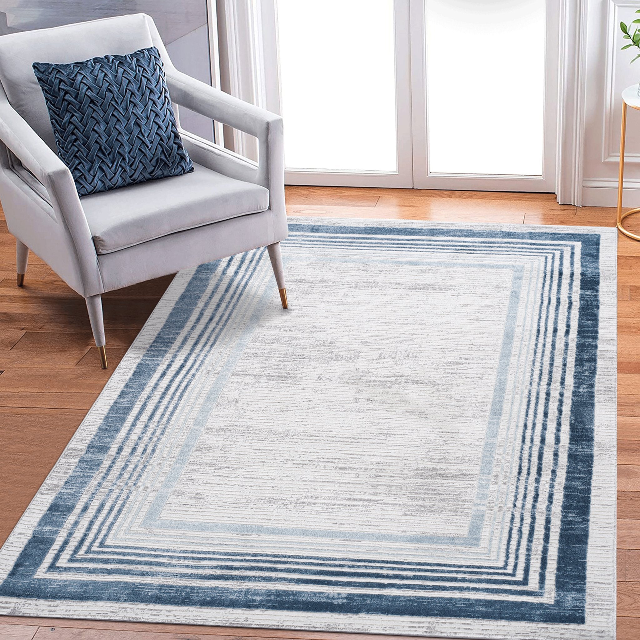 5X7 Blue/Ivory/Bordered Non-Shedding Stain Resistant Area Rug