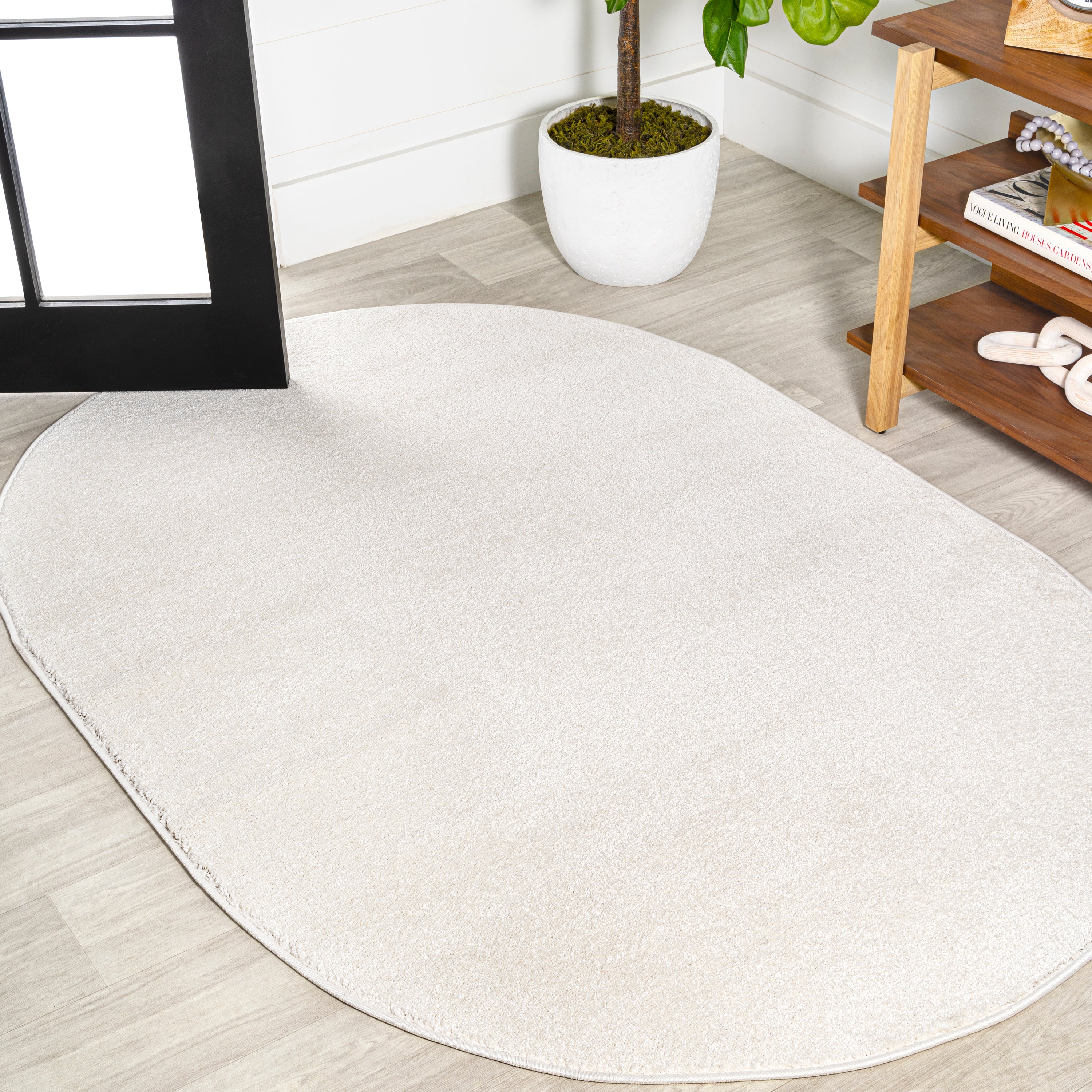 Haze Solid Unique Low-Pile Oval Area Rug